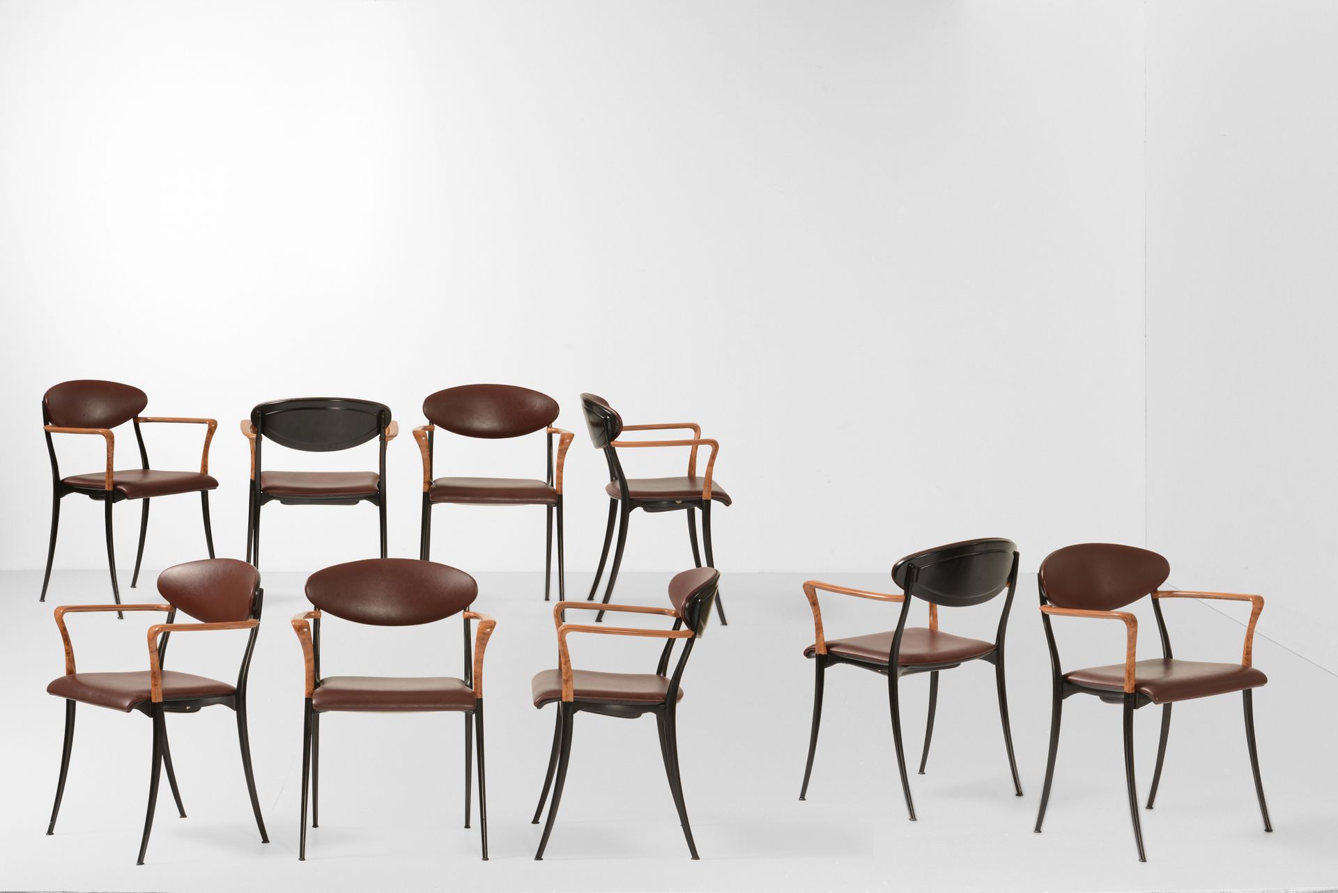 Luigi Origlia, Nove sedie con struttura in legno e metallo. Rivestimenti in cuoi&hellip;