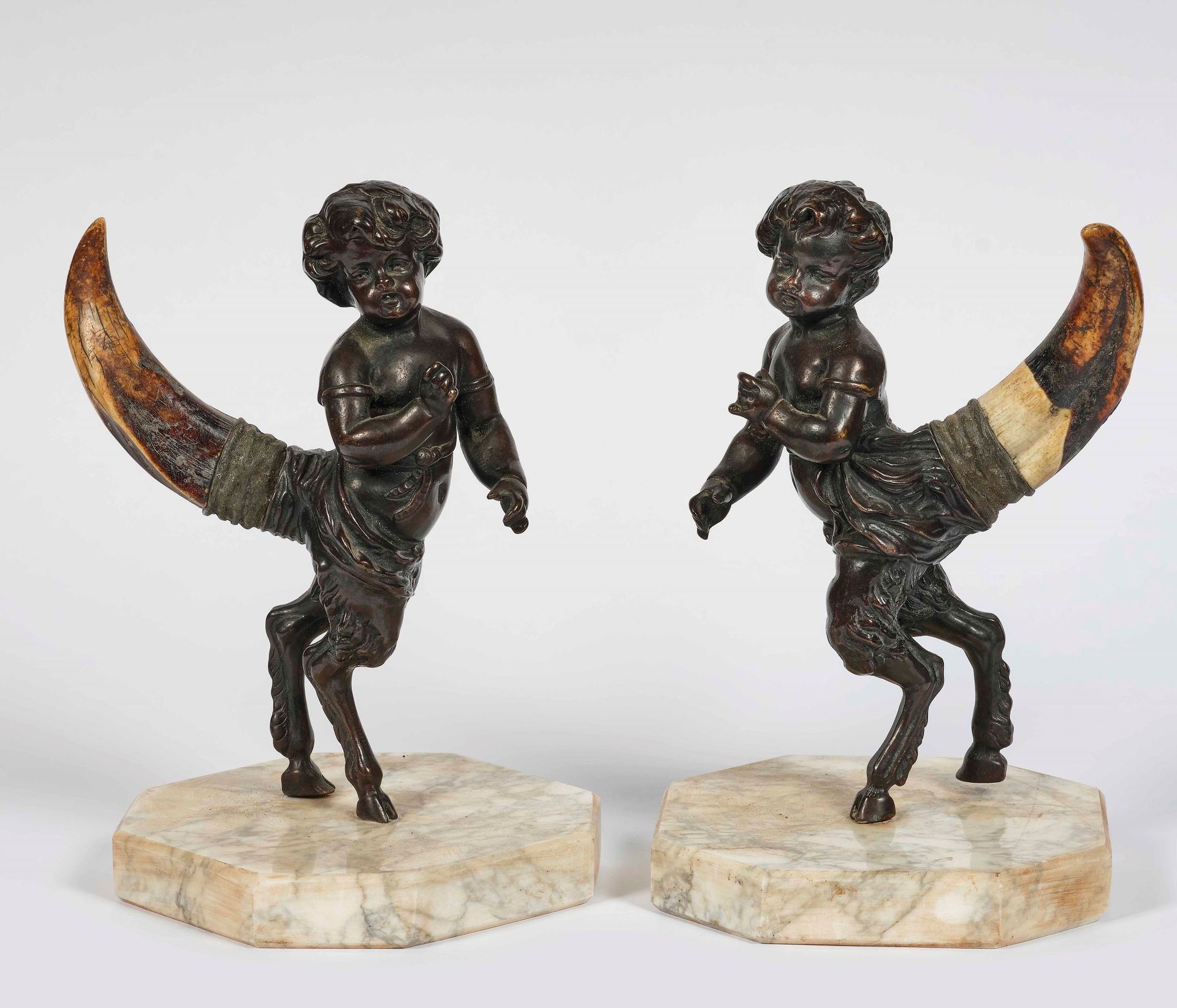 Coppia di satiri in bronzo e corno. Inizio XIX secolo Octagonal marble bases, H.&hellip;