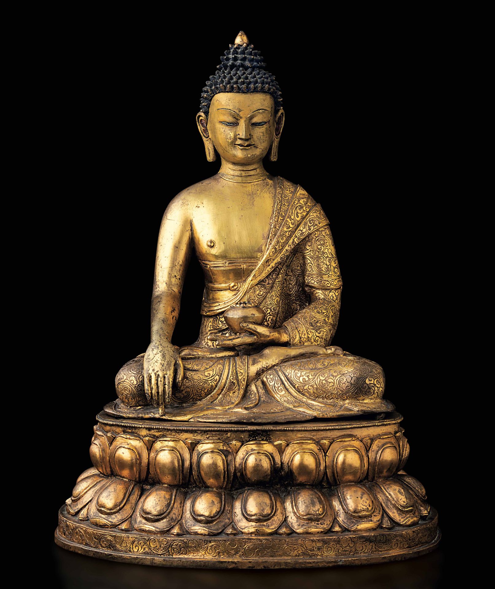 A gilt bronze Buddha Sakyamuni, Tibet, 1800s Traces of polychromy. Inscription o&hellip;