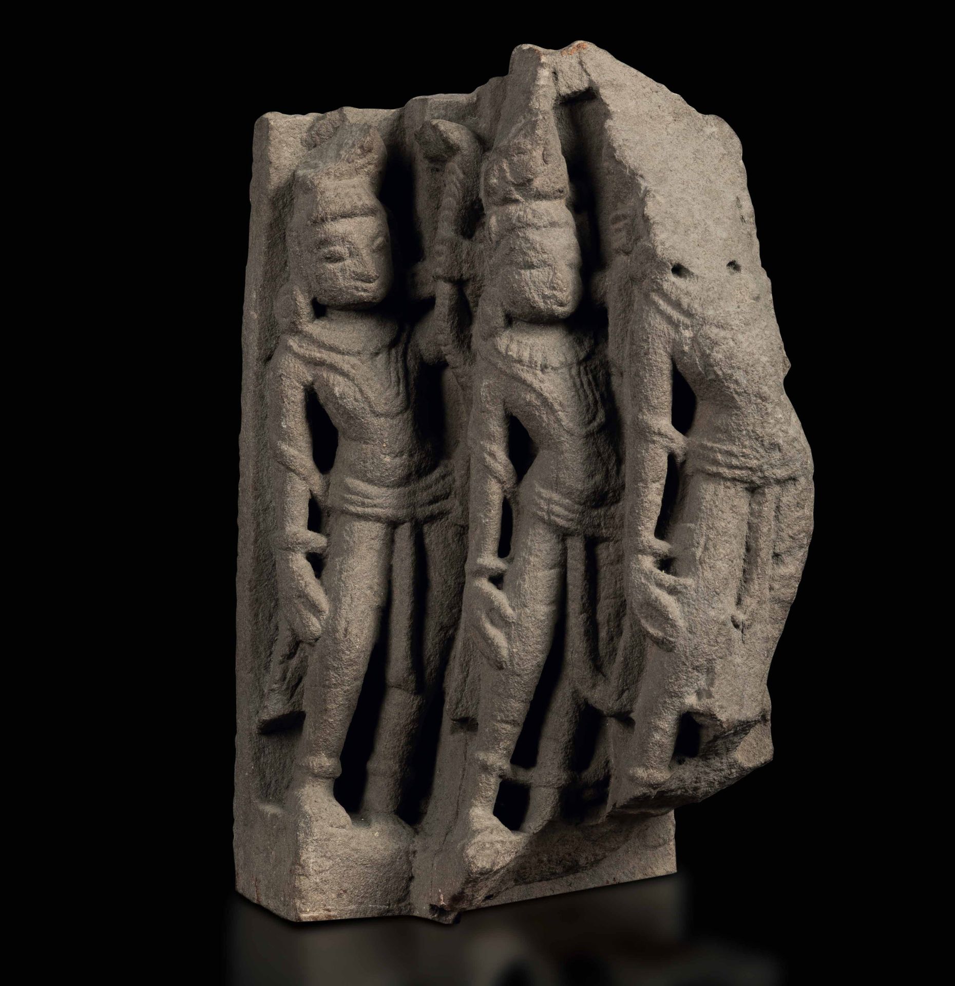 A stone stele of three deities, India, Pala-period 12/1300s H. 26 Cm