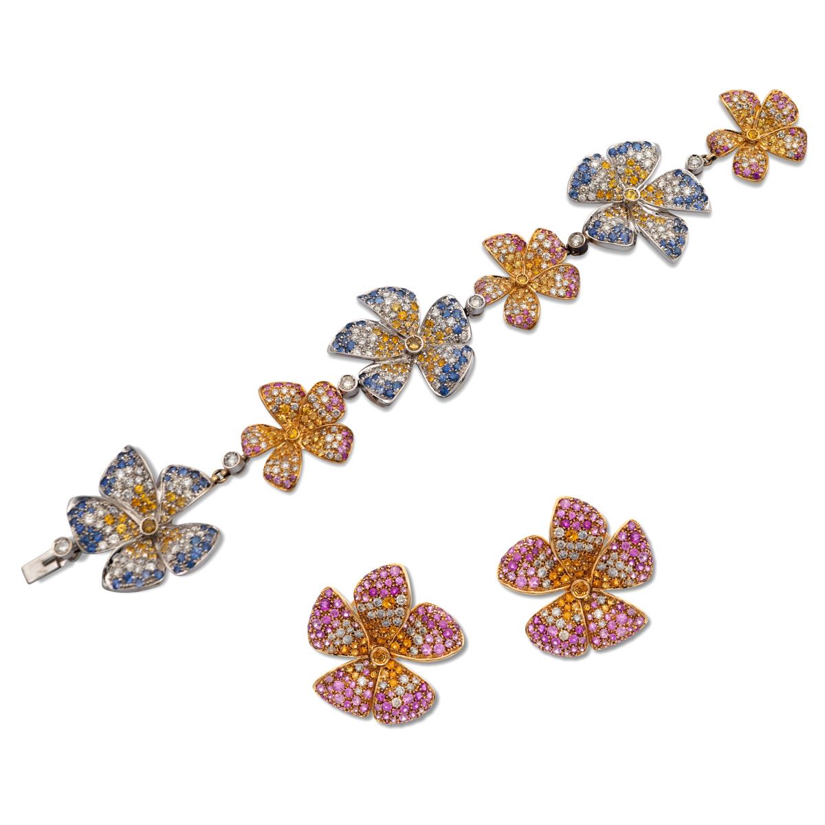 18kt white and yellow gold, sapphire and diamond floral parure weight 66,6 gr. 包&hellip;