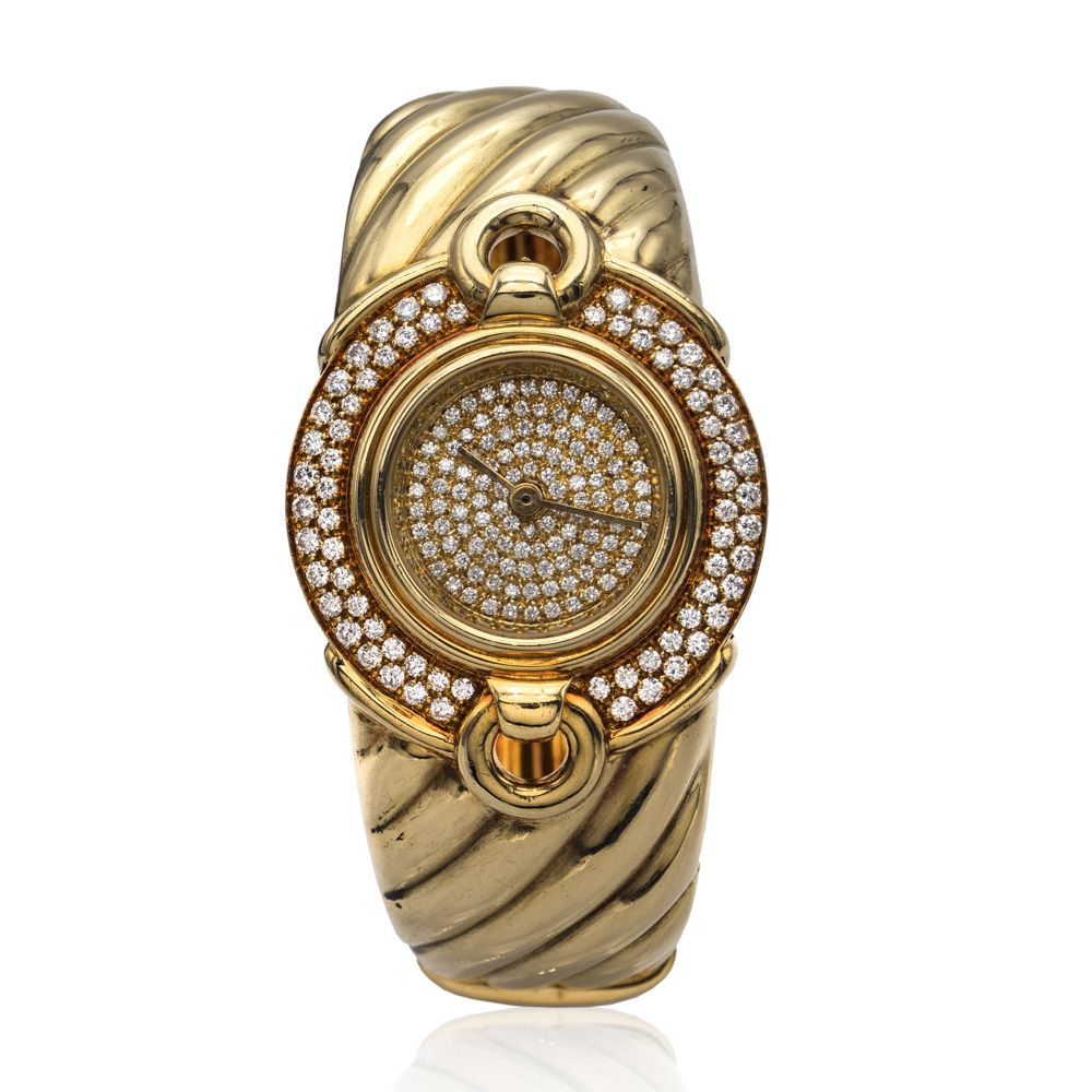 Ladies watch cuff bracelet 
signée Tinelli, années 1970/80, poids 76 gr., en or &hellip;