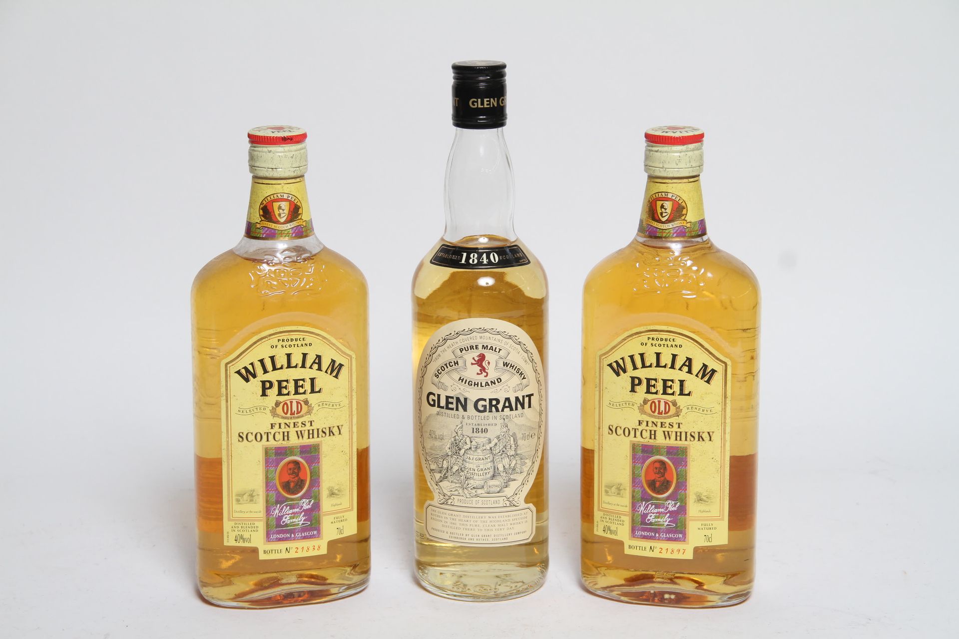 Null TWO BOTTLES OF WILLIAM PEEL WHISKY AND ONE OF GLEN GRANT