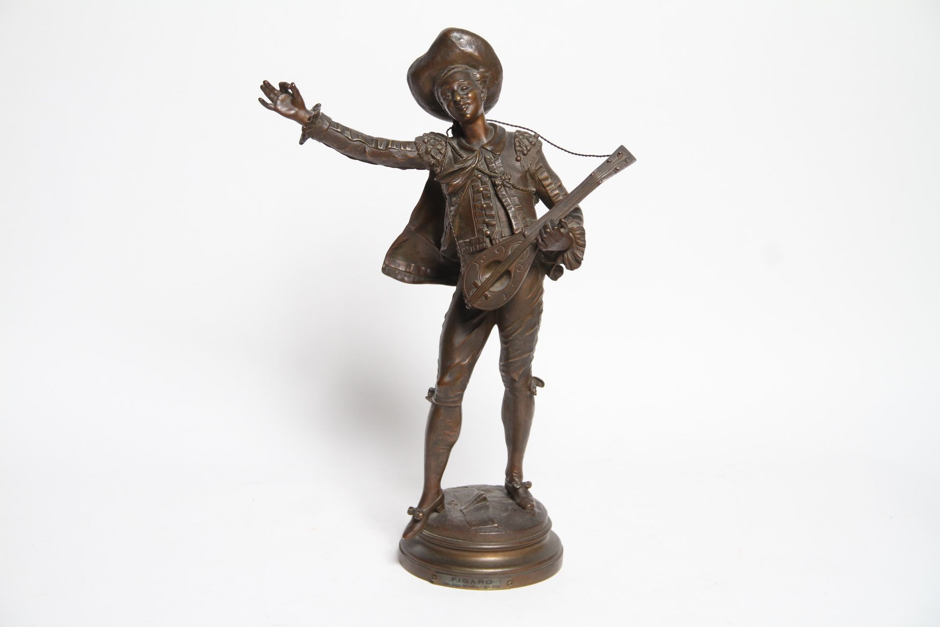 Null AFTER AUGUSTE MOREAU. FIGARO. BRONZE WITH BROWN PATINA. OLD CAST. H 44cm.
