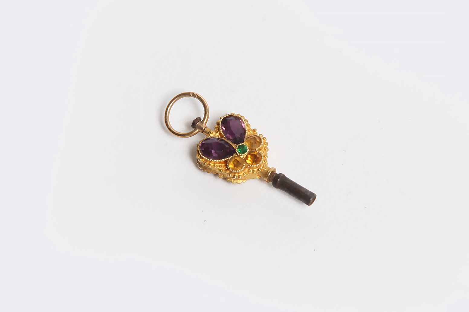 Null GOLDEN WATCH KEYS OF COLOURED STONES FORMING A THOUGHT (1,9 grs gross)