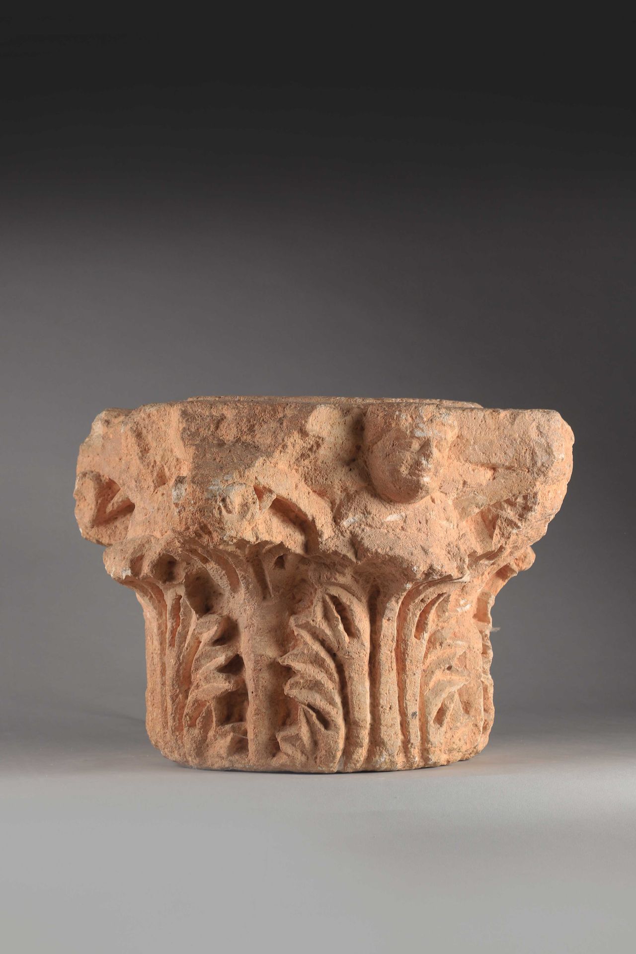 Null Limestone capital with orange pâtine and vegetal decoration and bust of a m&hellip;