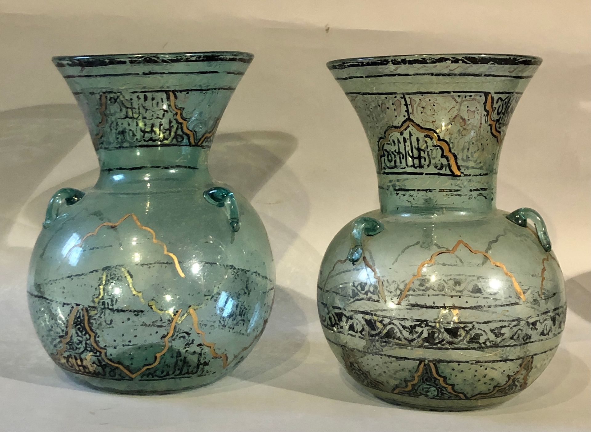 Null PAIR OF MOSQUE LAMPS IN THE SHAPE OF VASES OUT OF WHITE GLASS TINTED BLUE H&hellip;