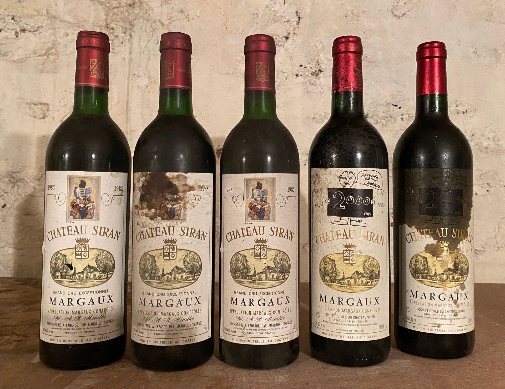 Null 5 botellas Château SIRAN - Margaux 3 de 1985 y 2 de 2000 Etiquetas manchada&hellip;