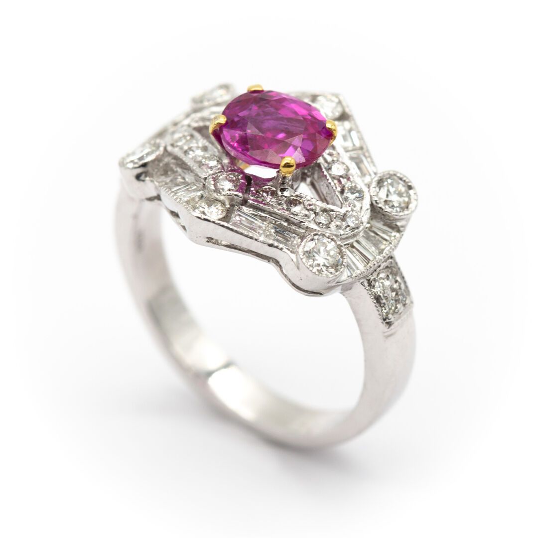 Null 18K white gold ring with a ruby between two brackets set with diamonds and &hellip;