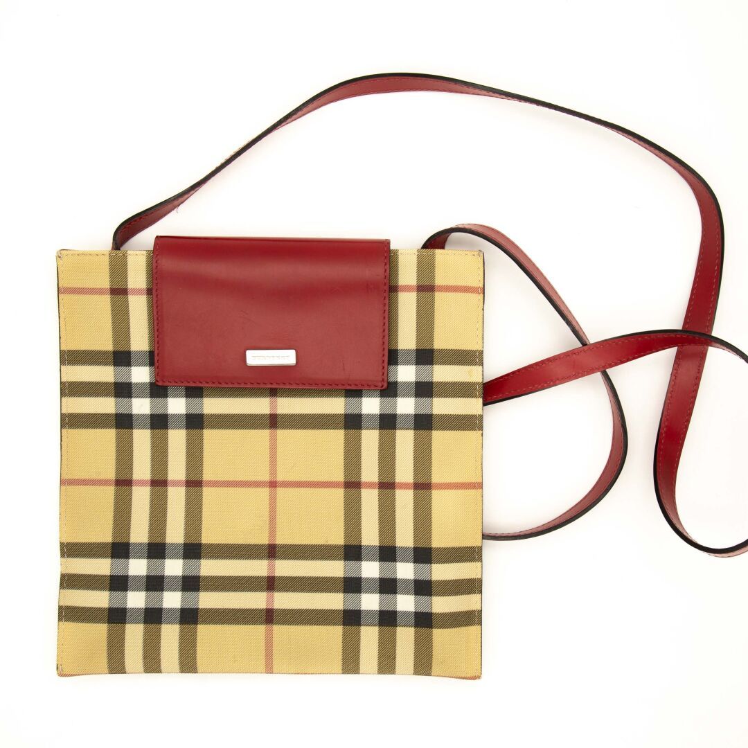 BURBERRY. Square and flat clutch bag with Haymarket chec…
