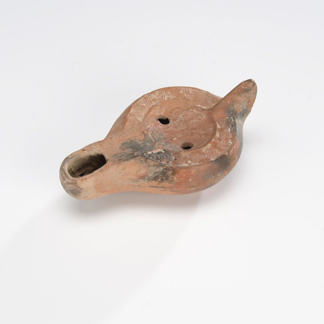 Null Oil lamp with channel spout, decorated with a galloping horse passing to th&hellip;