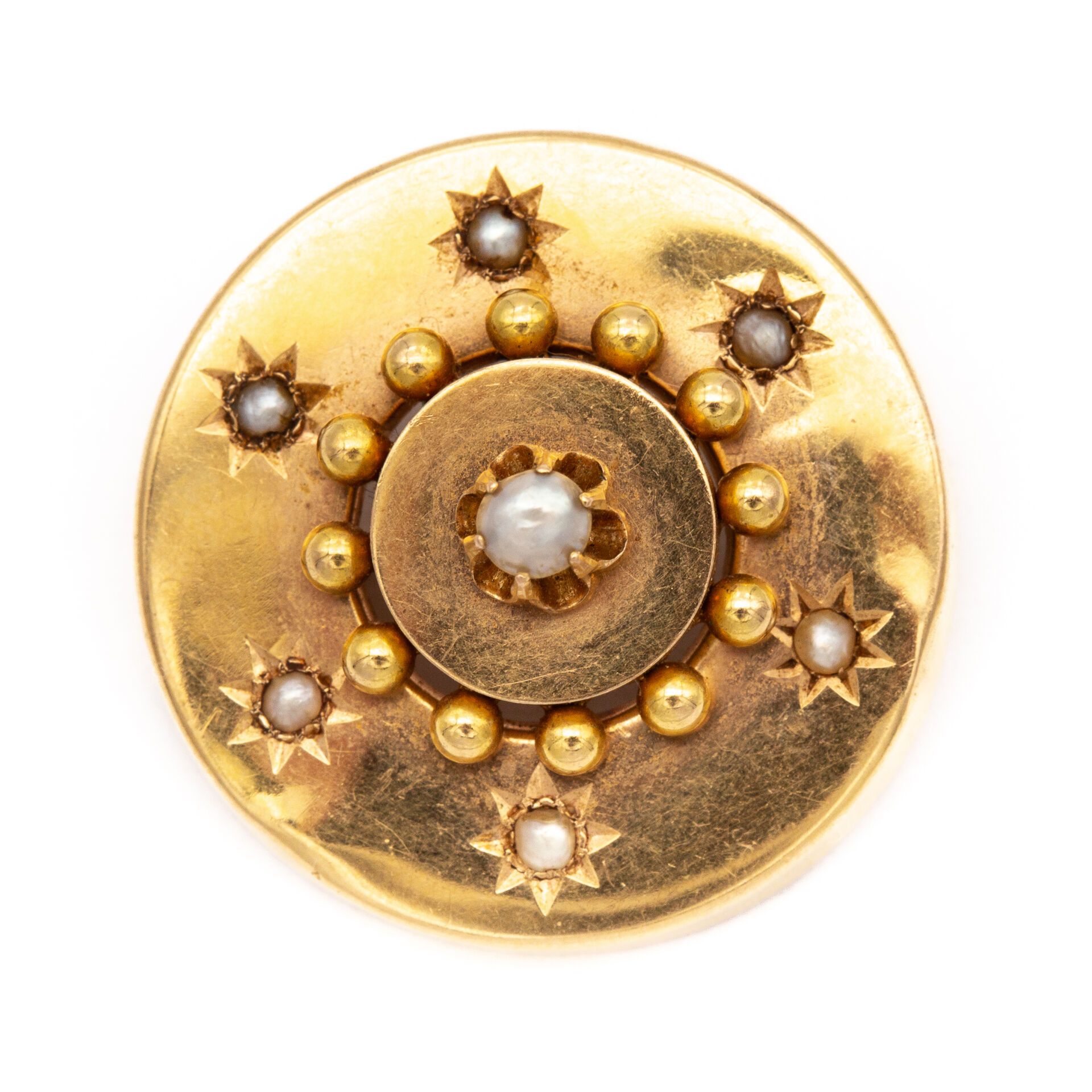 Null Broche en or jaune (750) 18K de forme ronde, motif perlé avec serti étoilé &hellip;
