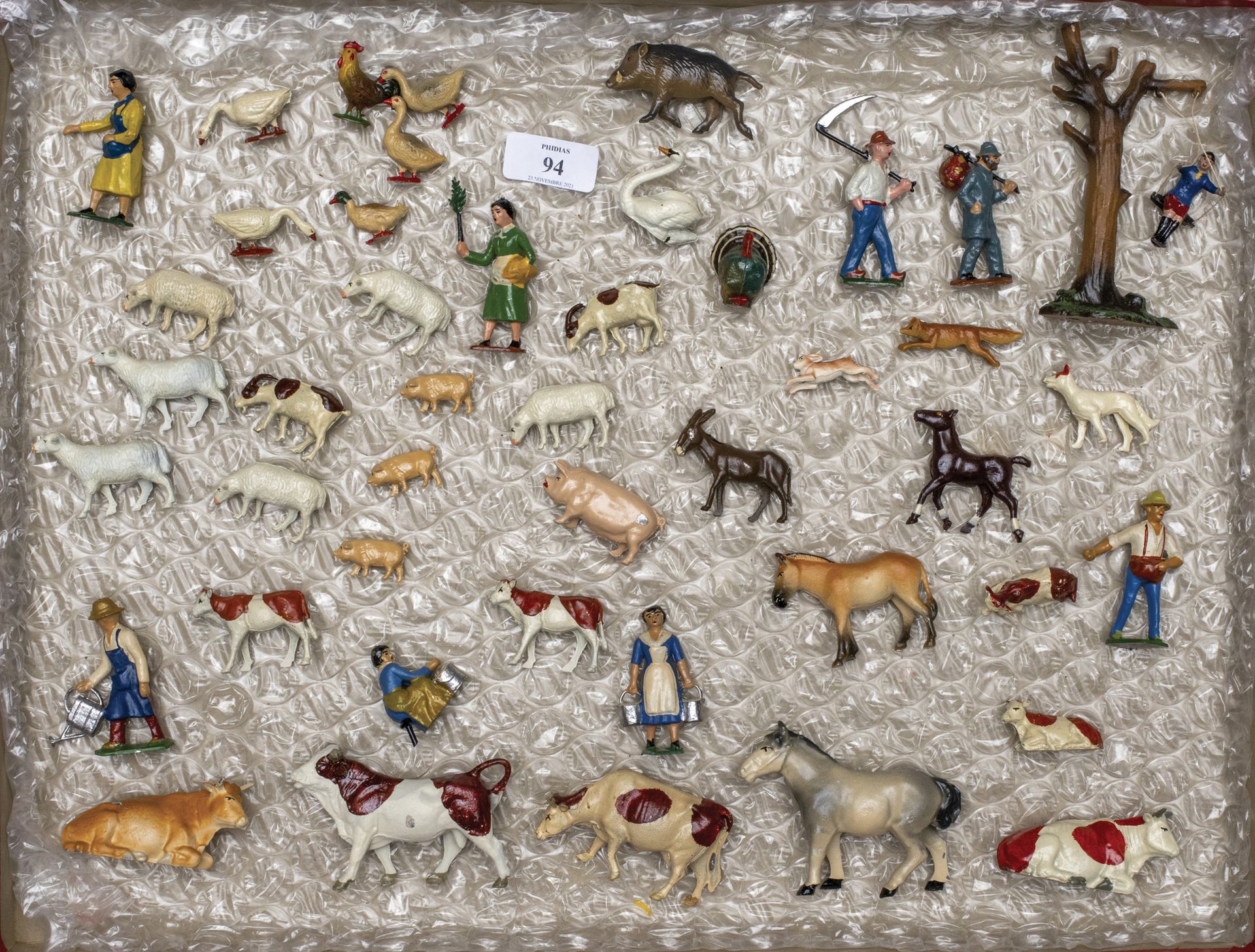 . The farm. Farmers. Large animals: horses, oxen, cows, foals and  calves. Small animals: pigs, sheep, dogs, swan, rooster and barnyard. Girl  with swing, wanderer. (50 pieces). Hollow lead near new in