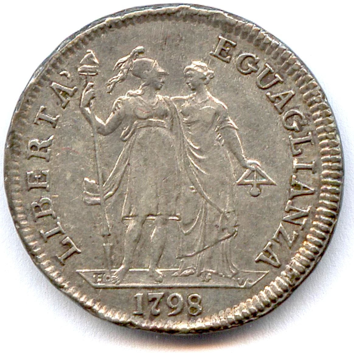 Null LIGURIAN REPUBLIC 1798-1805

Una Lira silver year 4-1798. 

(4,13 g) VG 616&hellip;