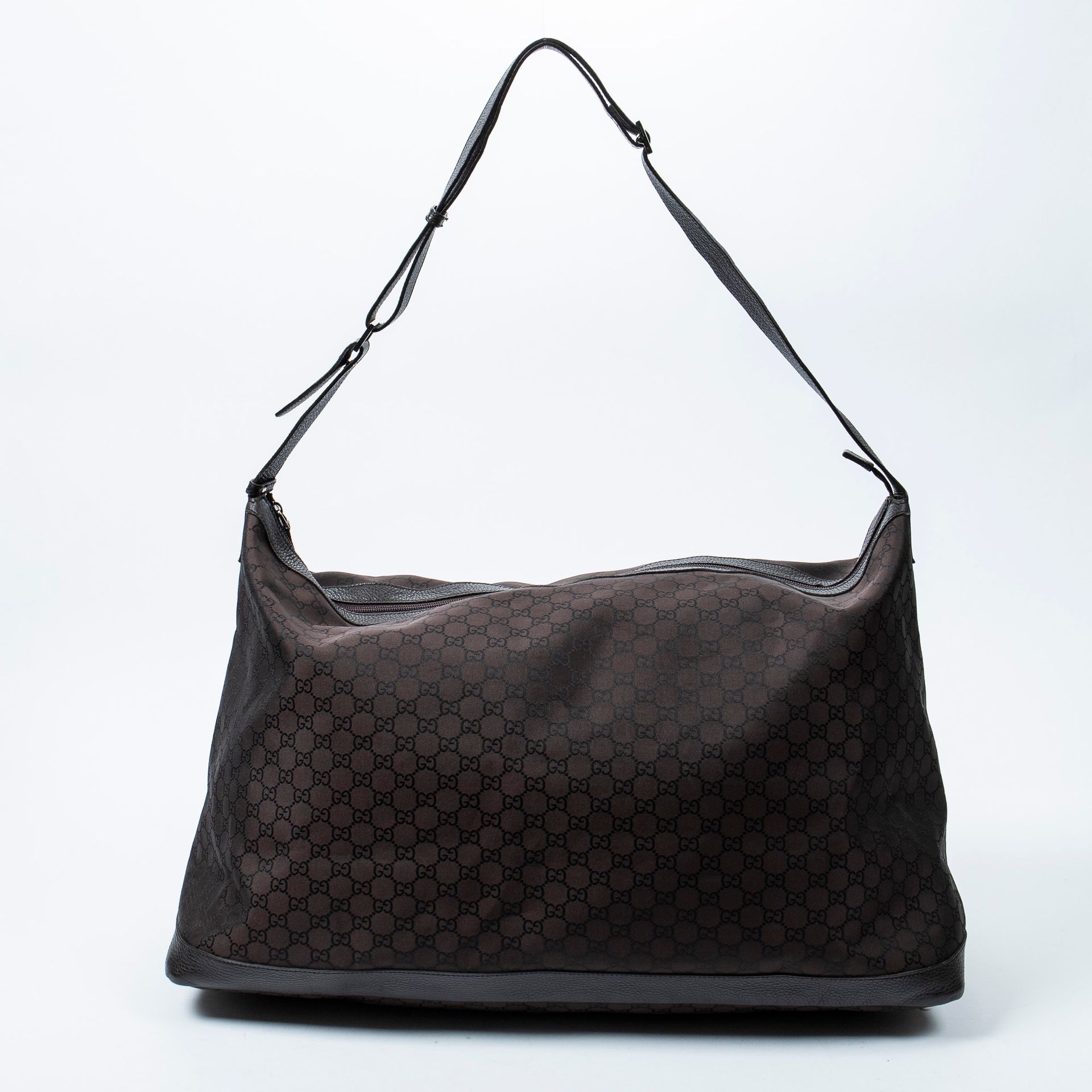 Gucci GUCCI - 一字形帆布和棕色粒面革旅行包 - 棕色织物内衬 - 拉链开合 - 可调节肩带 - 镀铬金属开合 - 尺寸：58x40x27厘米 - &hellip;