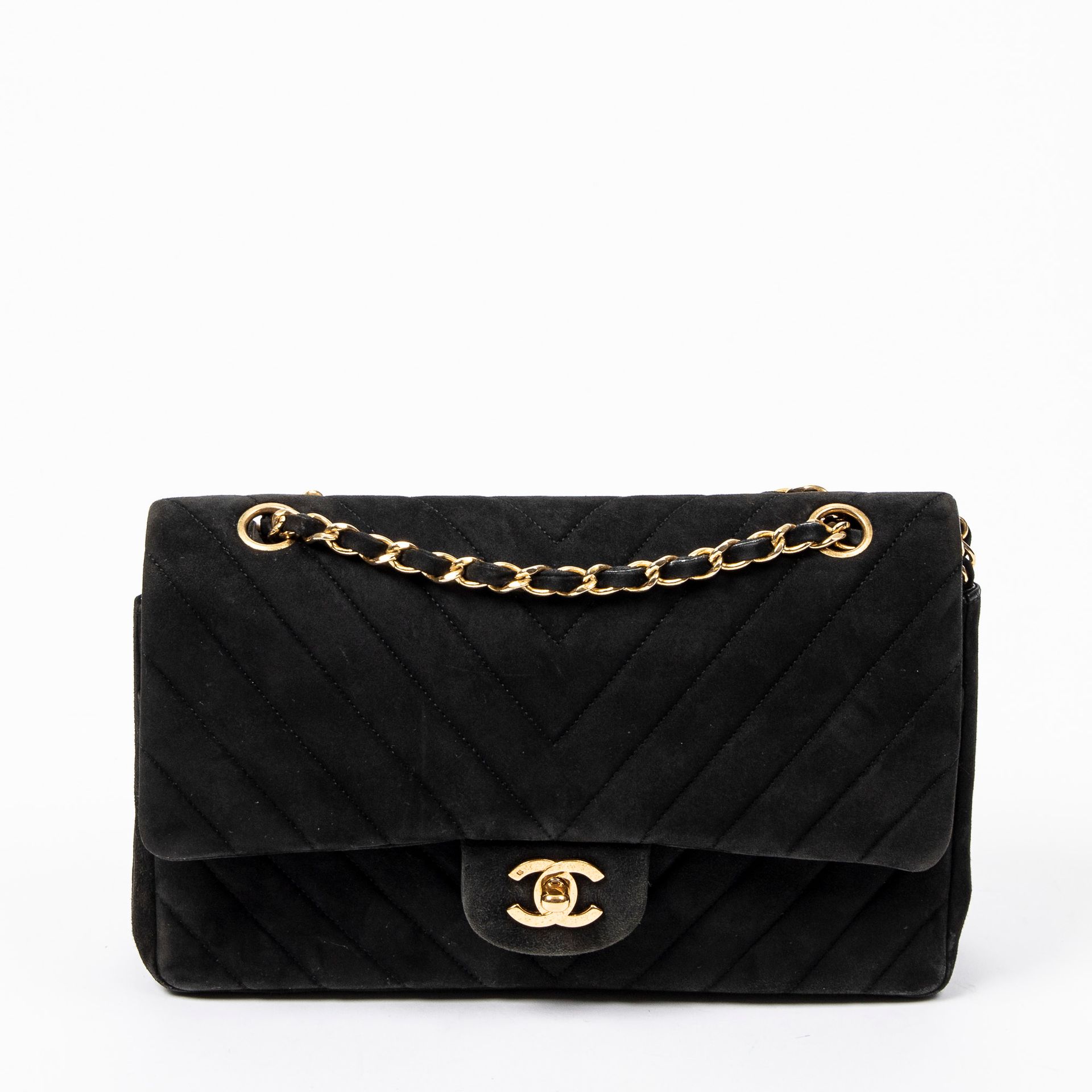 Chanel 香奈儿 - 永恒的黑色皮革双翻盖包 - 内衬黑色小羊皮 - 带皮革嵌件的链条，可手提或肩背 - 镀金金属首饰 - 有真品编号 - 尺寸：25x15&hellip;