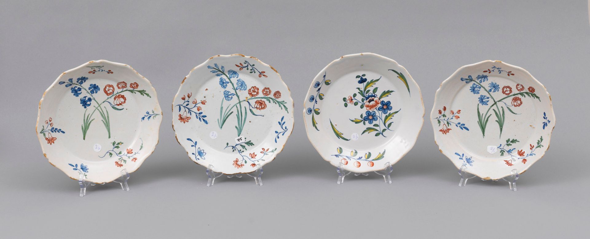 Faience Nevers 
Nevers_

Four earthenware plates with contoured edges with polyc&hellip;