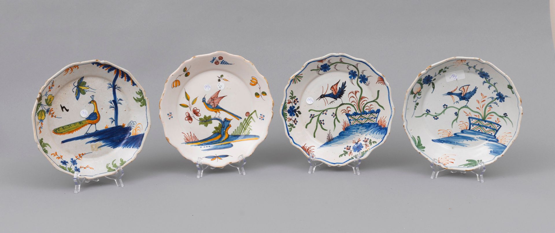 Faience Nevers 
Nevers

Four earthenware plates with contoured edges to dp of a &hellip;