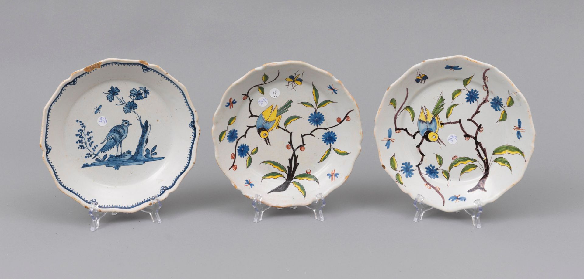 Faience Nevers 
Nevers

Three earthenware plates with contoured edges to dp in t&hellip;