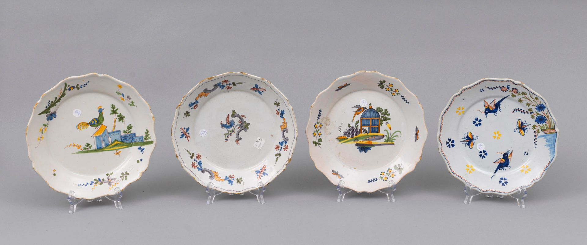 Faience Nevers 
Nevers 

Four earthenware plates with contoured edges with birds&hellip;