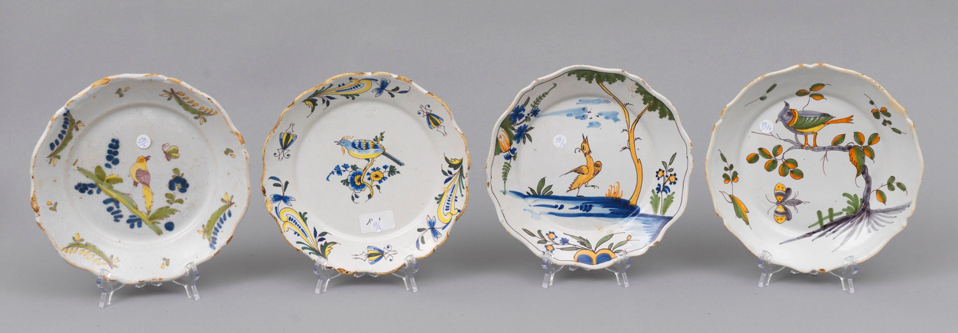 Faience Nevers 
Nevers 

Four earthenware plates with contoured edges, with dp o&hellip;