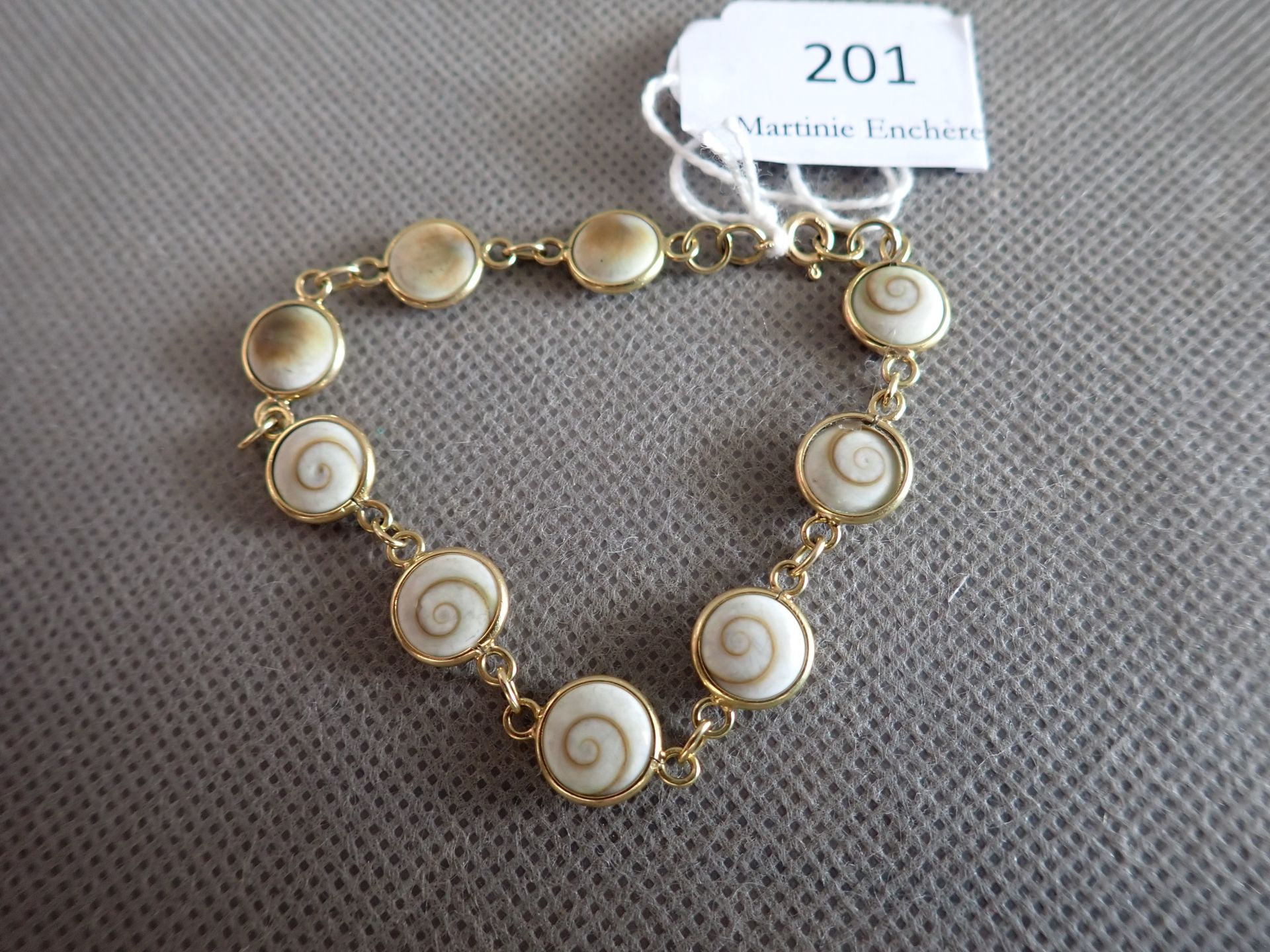 Null Bracelet, or et coquillages, poids 12,3 gr tel, L 20 cm
