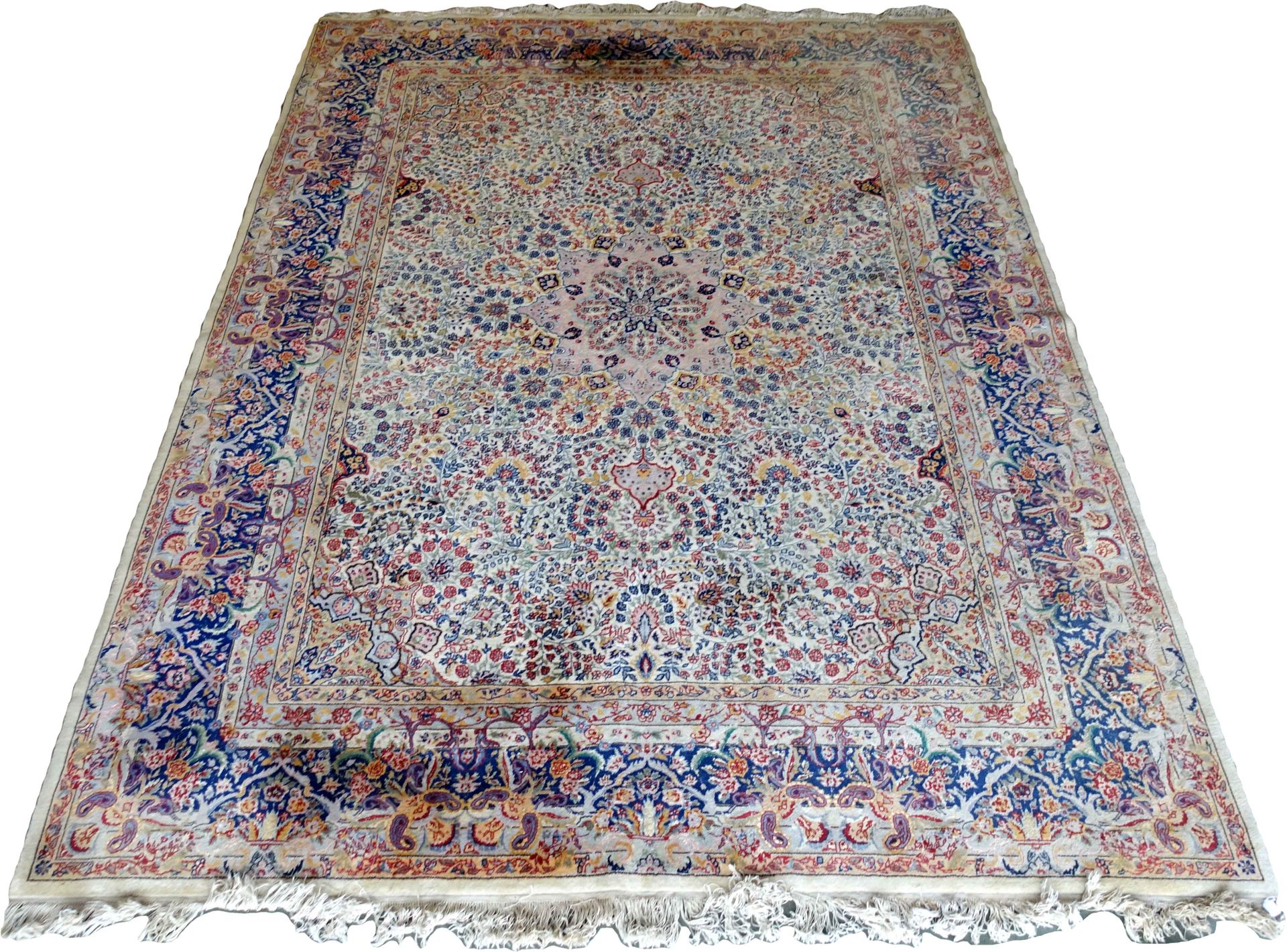Tapis Kirman. Centered by a small medallion in a frame of semis of flowers. Larg&hellip;