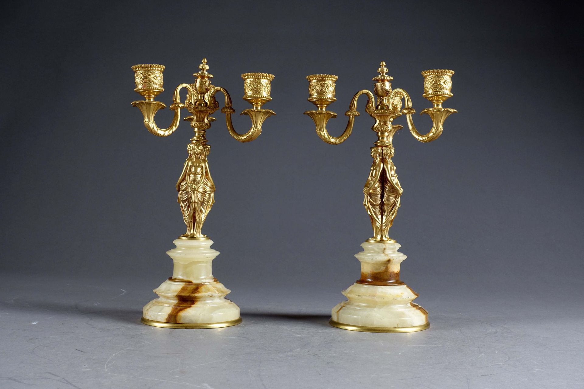 Paire de Flambeaux. With lights carried by three caryatids resting on a molded o&hellip;