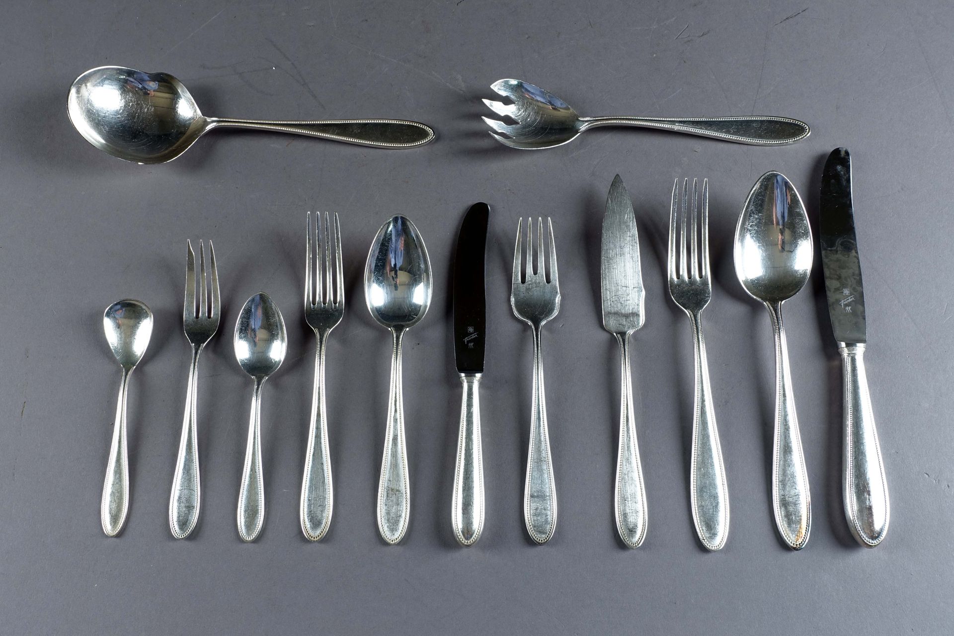 W.M.F. Perles" set of cutlery. It presents twelve dinner forks, twelve soup spoo&hellip;