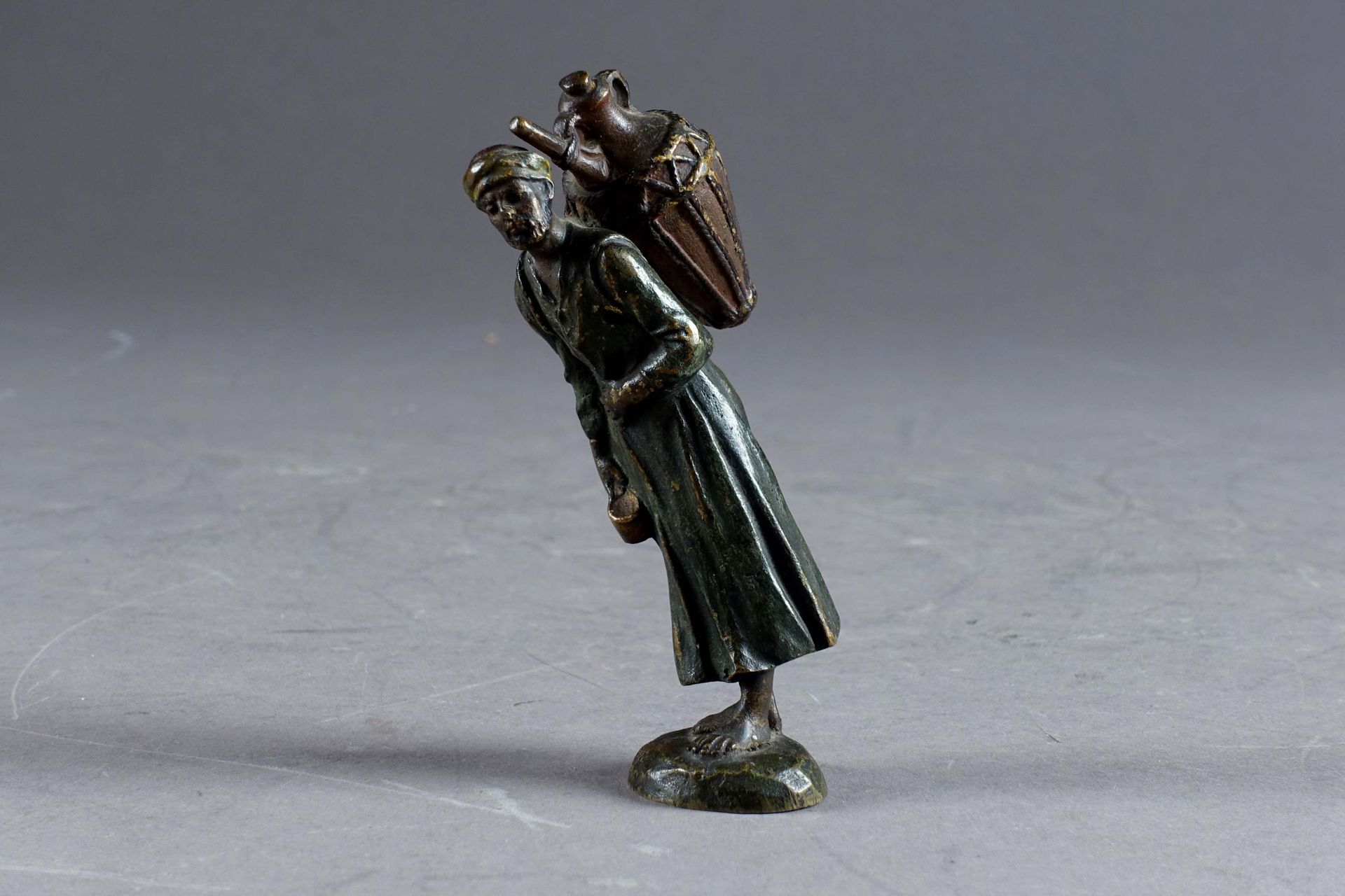 VIENNE. Oriental water carrier, carrying an amphora. Enamelled bronze statuette.&hellip;