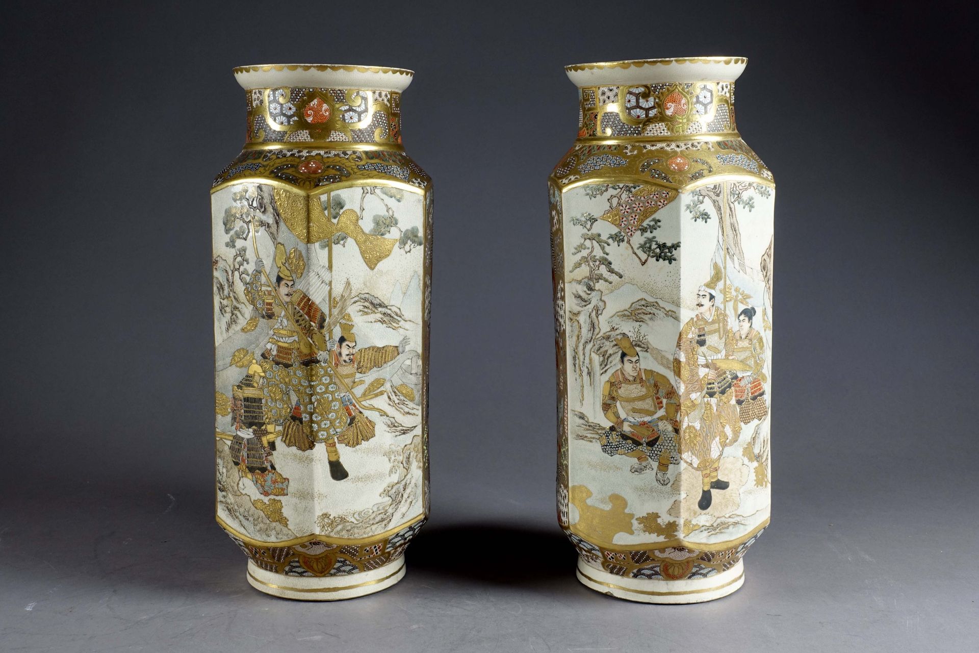 Satsuma. Pair of octagonal vases decorated with notables and samurai on a clathr&hellip;