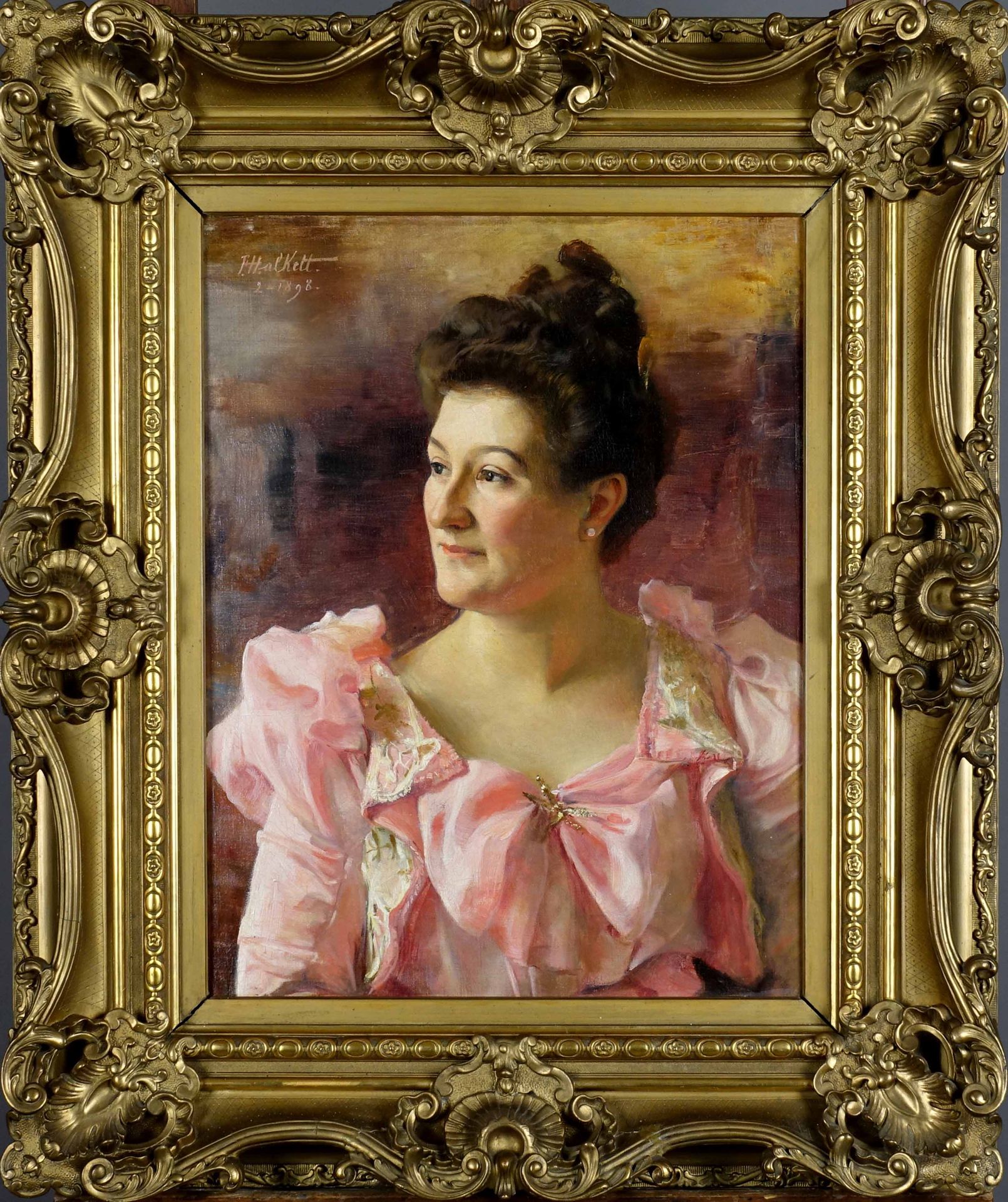 François Jos. Clément Halkett (1856-1921). 穿粉红色衣服的女士。(1898年)。布面油画，左上方有签名。尺寸：60 x&hellip;