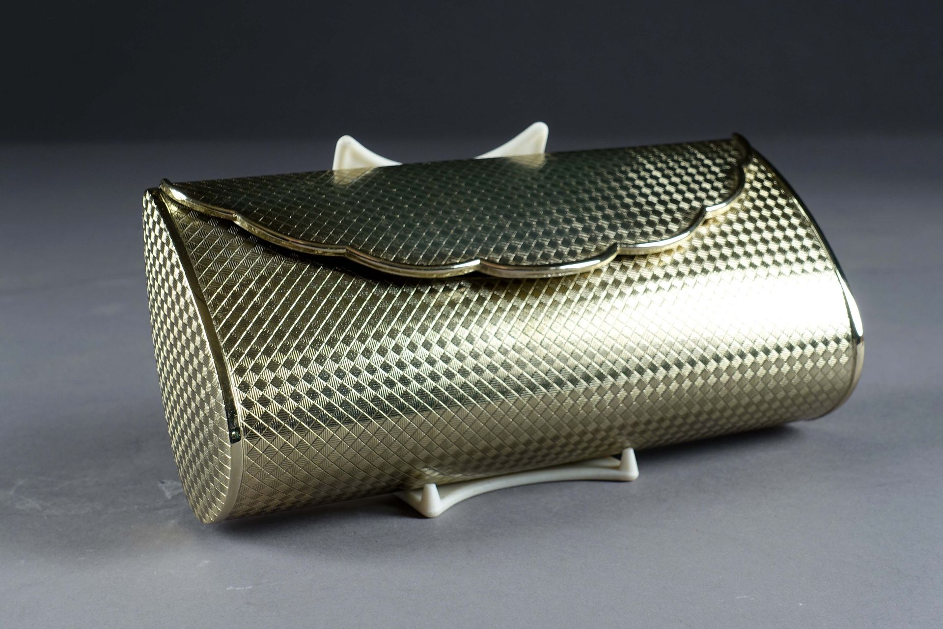 Minaudière. With a lid revealing a mirror. Metal with a checkerboard pattern, gi&hellip;