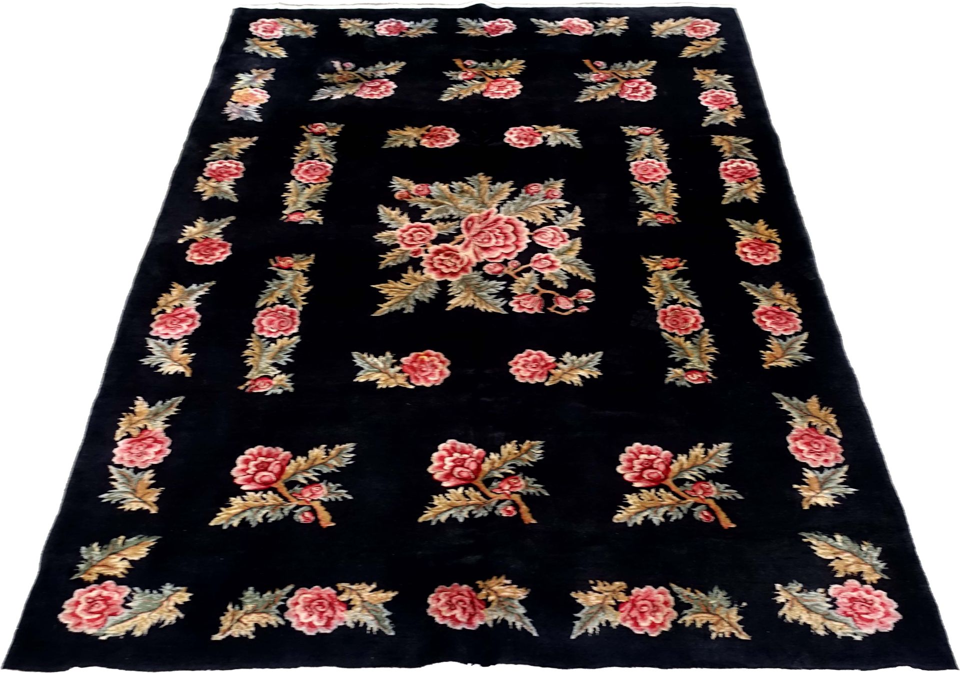 Tapis Ghoum. The background, plain black, presents bouquets of red flowers surro&hellip;