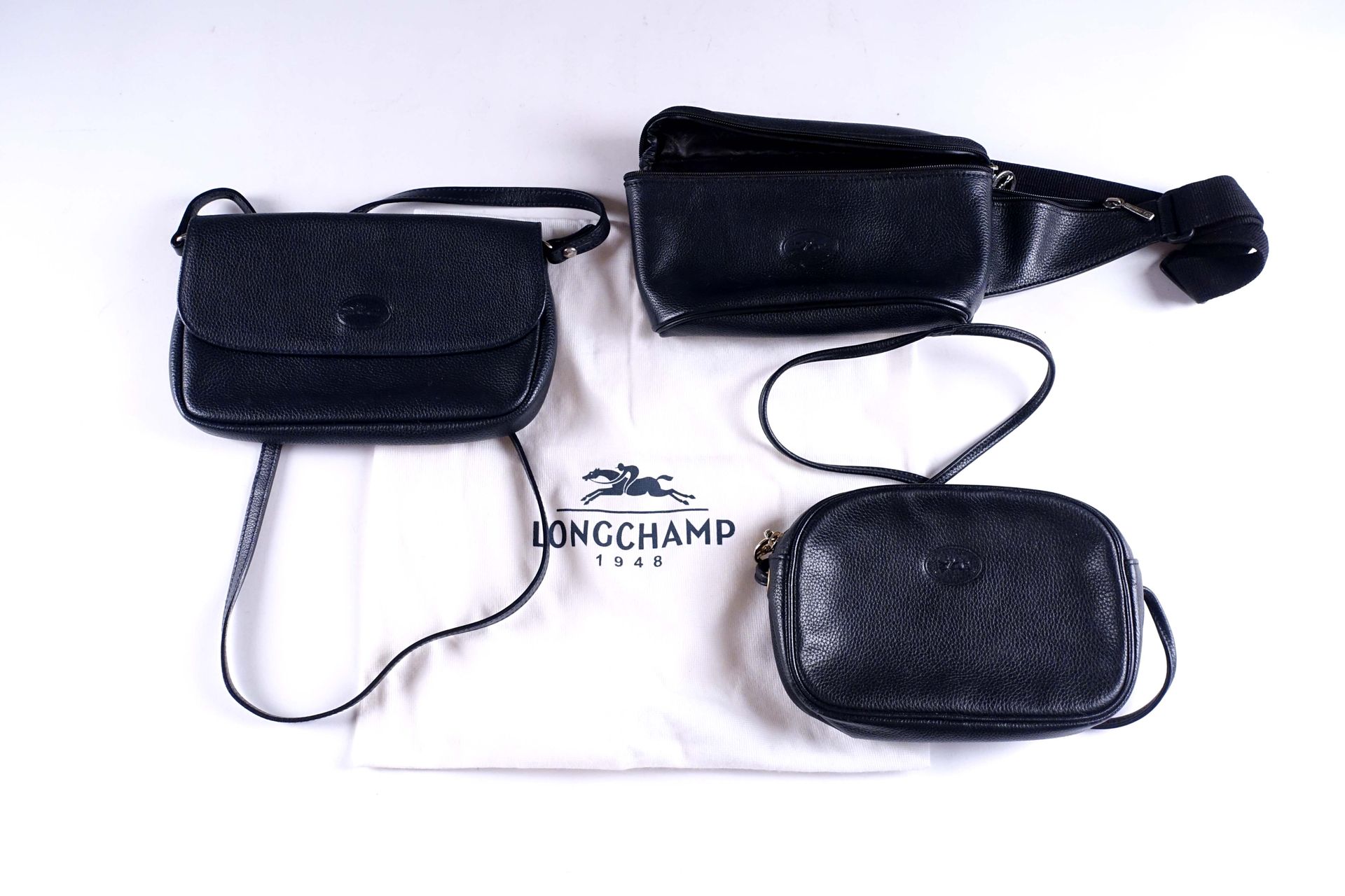 LONGCHAMP. Two pockets with shoulder strap and flap closure and zipper. We add a&hellip;