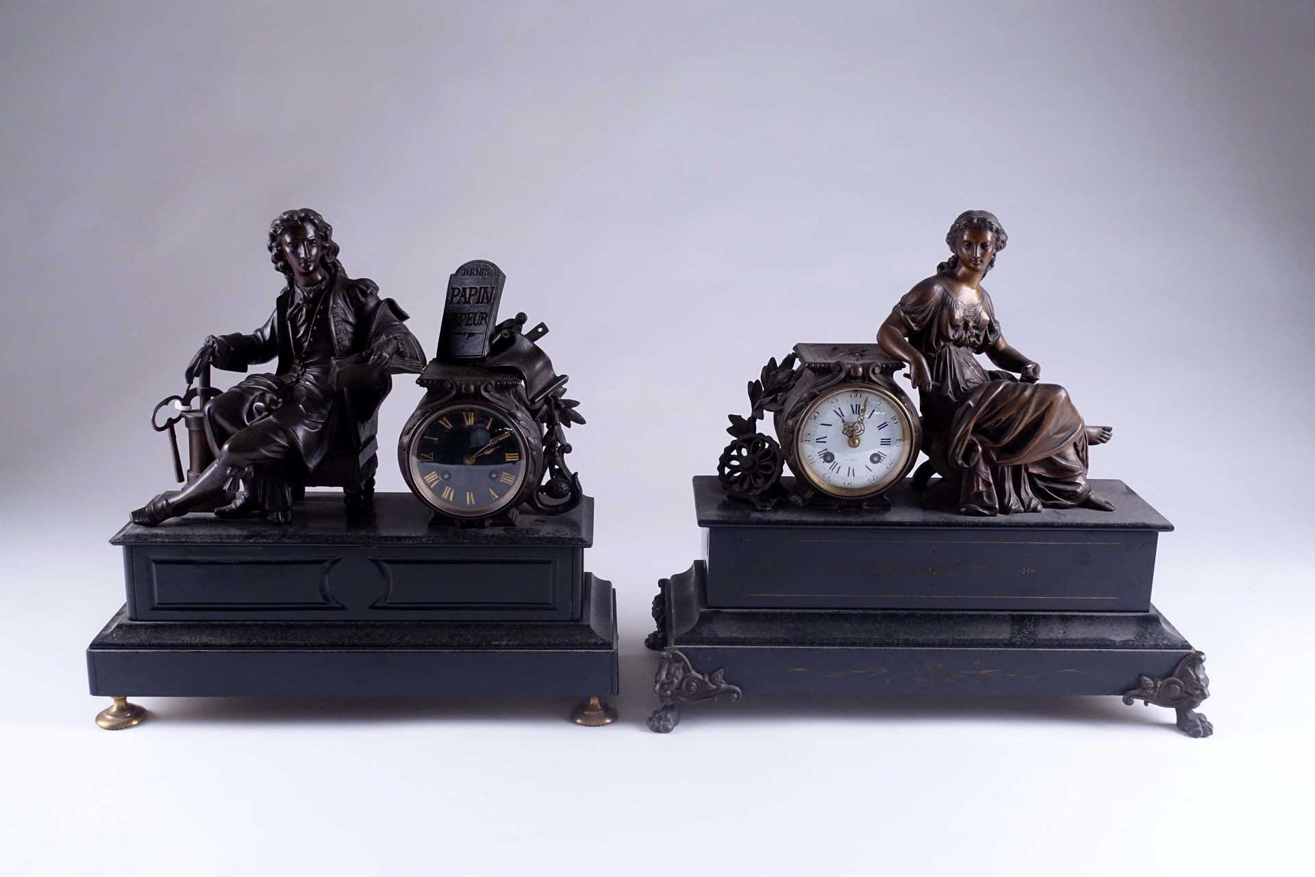 Pendule. Figurant Denis Papin working at the steam engine. Black marble and pati&hellip;