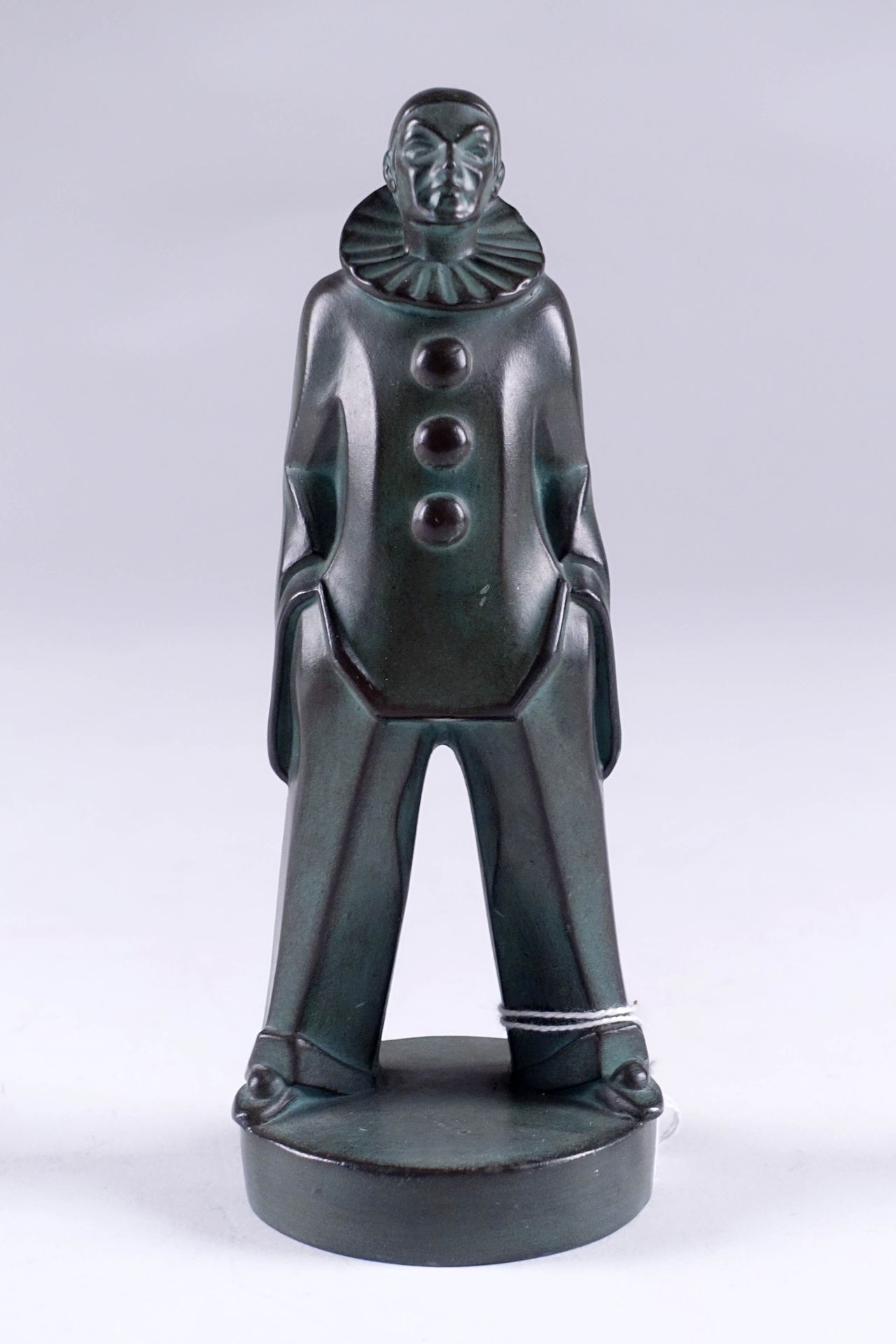 MAX LE VERRIER (1891-1973). Pierrot standing. Mascot in metal with green patina.&hellip;