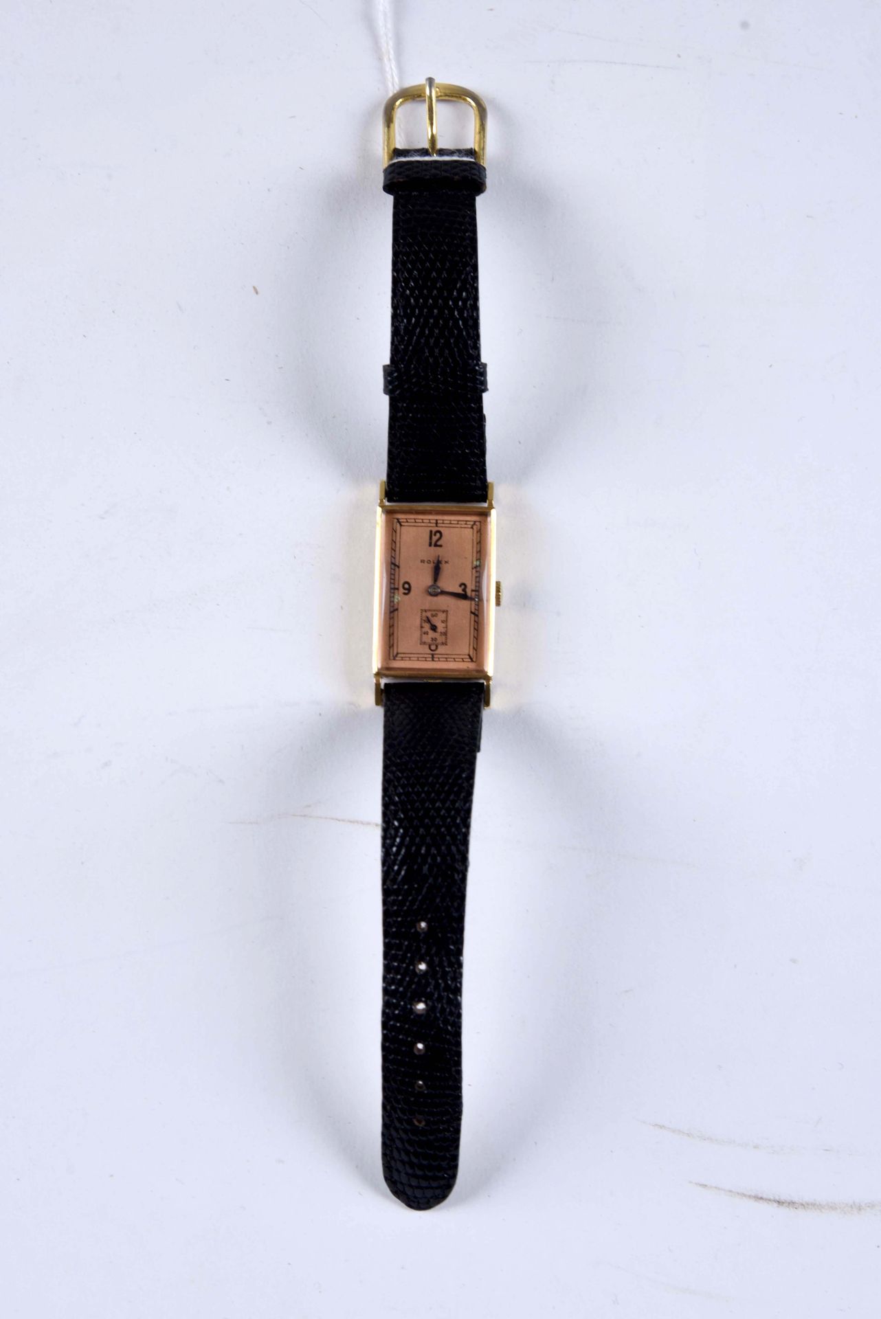 Rolex. Montre bracelet Art Déco Brancard. Cadran cuivré. Petites secondes à six &hellip;