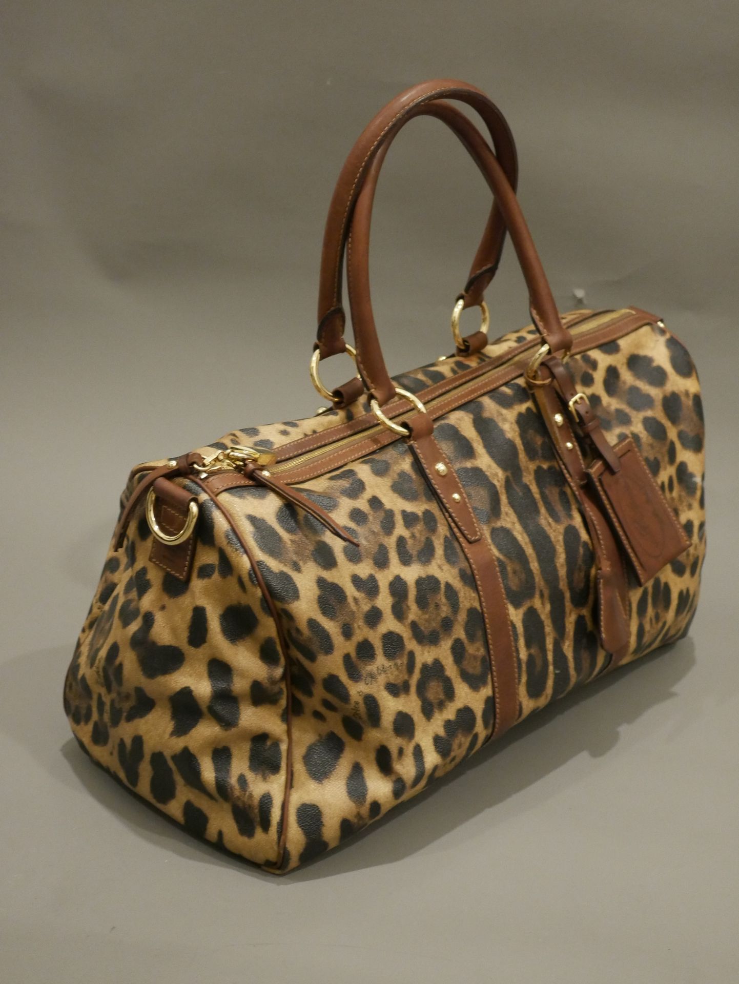 Null DOLCE GABBANA. Leather travel bag with leopard print. Zip closure. Double h&hellip;
