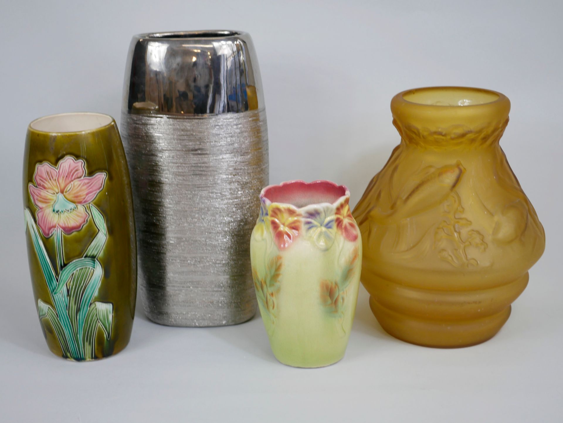 Null Lot including four vases, one in molded glass paste, two in slip and one mo&hellip;