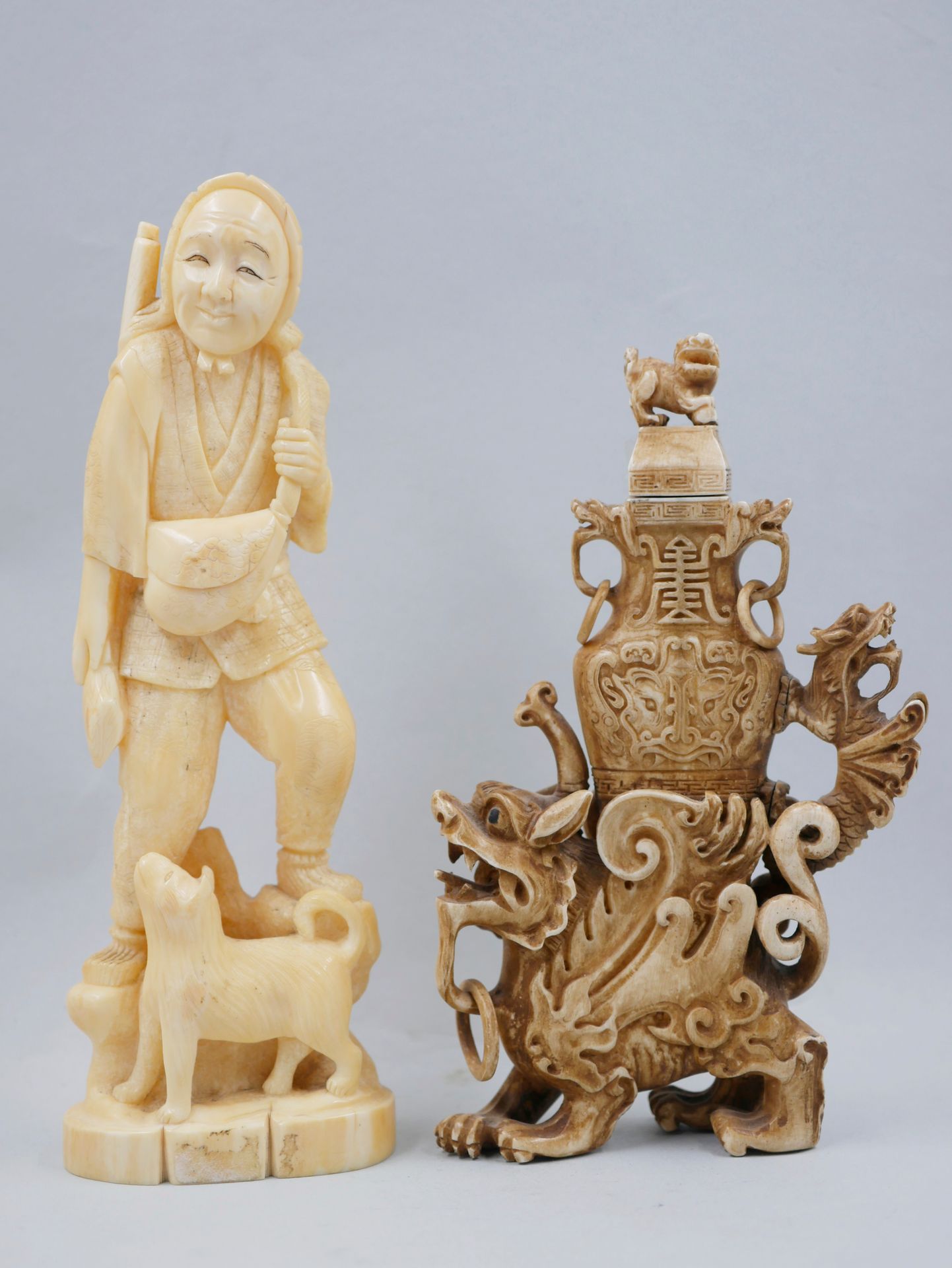 Null ASIA, 20th century. Lot including a hunter and his dog (Japan). Resin. Heig&hellip;