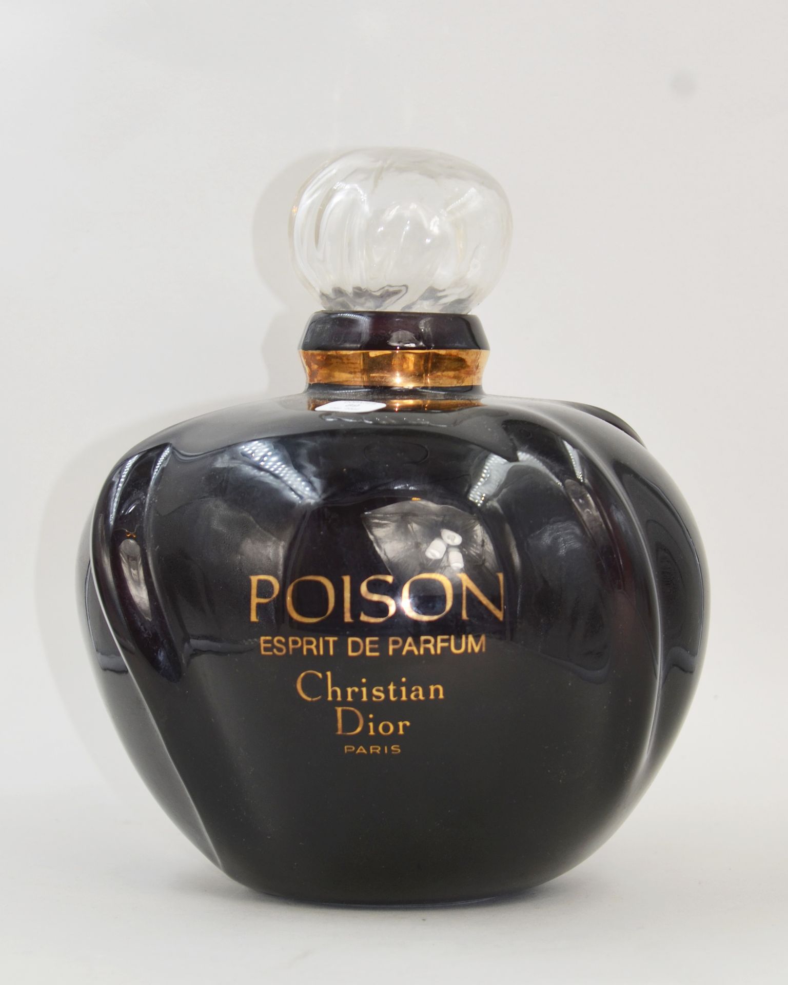 Null CHRISTIAN DIOR "香水的毒药精神

装饰性假瓶，紫色有色玻璃，金字标题。

高：23厘米