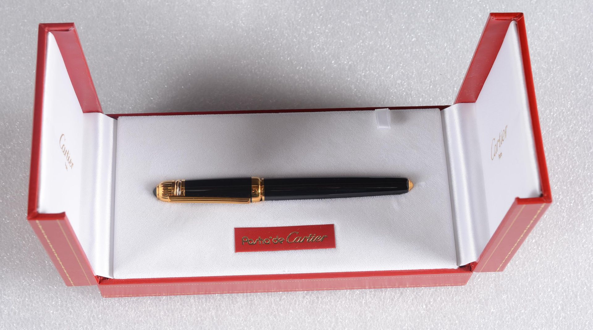 CARTIER,Stylo plume CARTIER,

Pasha fountain pen (old model), dark lacquer barre&hellip;