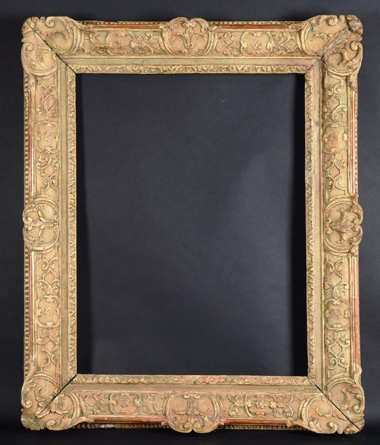 Cadre XVIIIème Carved and gilded wood frame, corners with escutcheons and cartou&hellip;