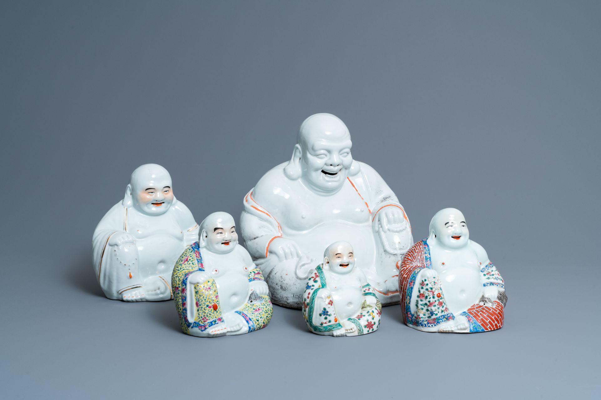 Five Chinese famille rose and white figures of Buddha, seal marks, 19/20th C. Ti&hellip;