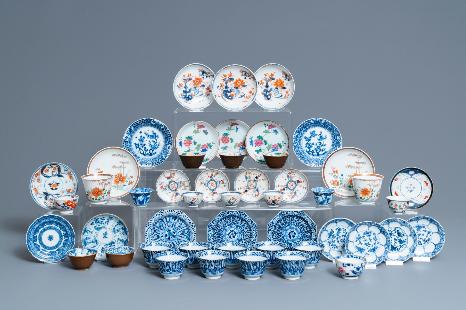 Twenty-four Chinese cups and twenty-five saucers in blue and white, famille rose&hellip;
