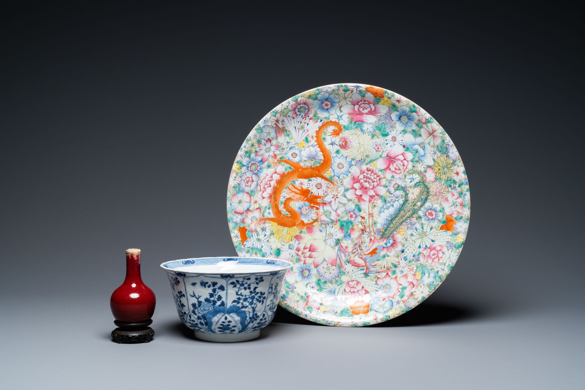 A Chinese famille rose dish, a blue and white bowl and a sang de boeuf vase, 19/&hellip;