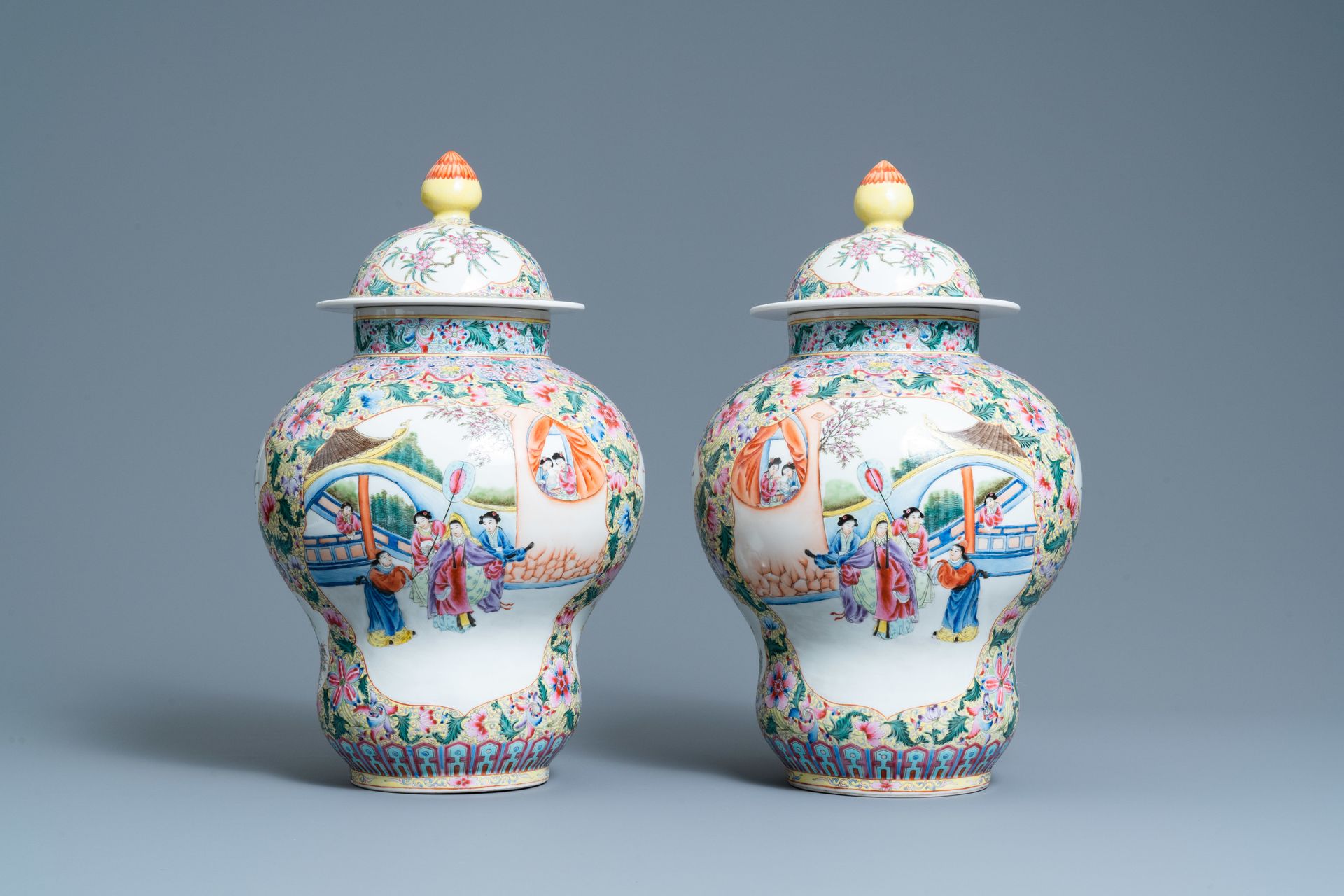 A pair of Chinese famille rose yellow-ground vases and covers, Qianlong mark, Re&hellip;