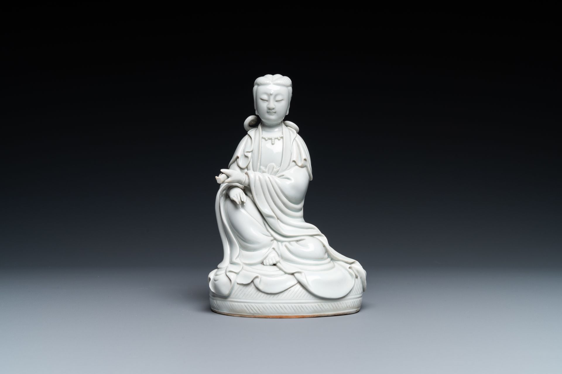 A Chinese Dehua blanc de Chine figure of Guanyin, 19/20th C. Full title: A Chine&hellip;