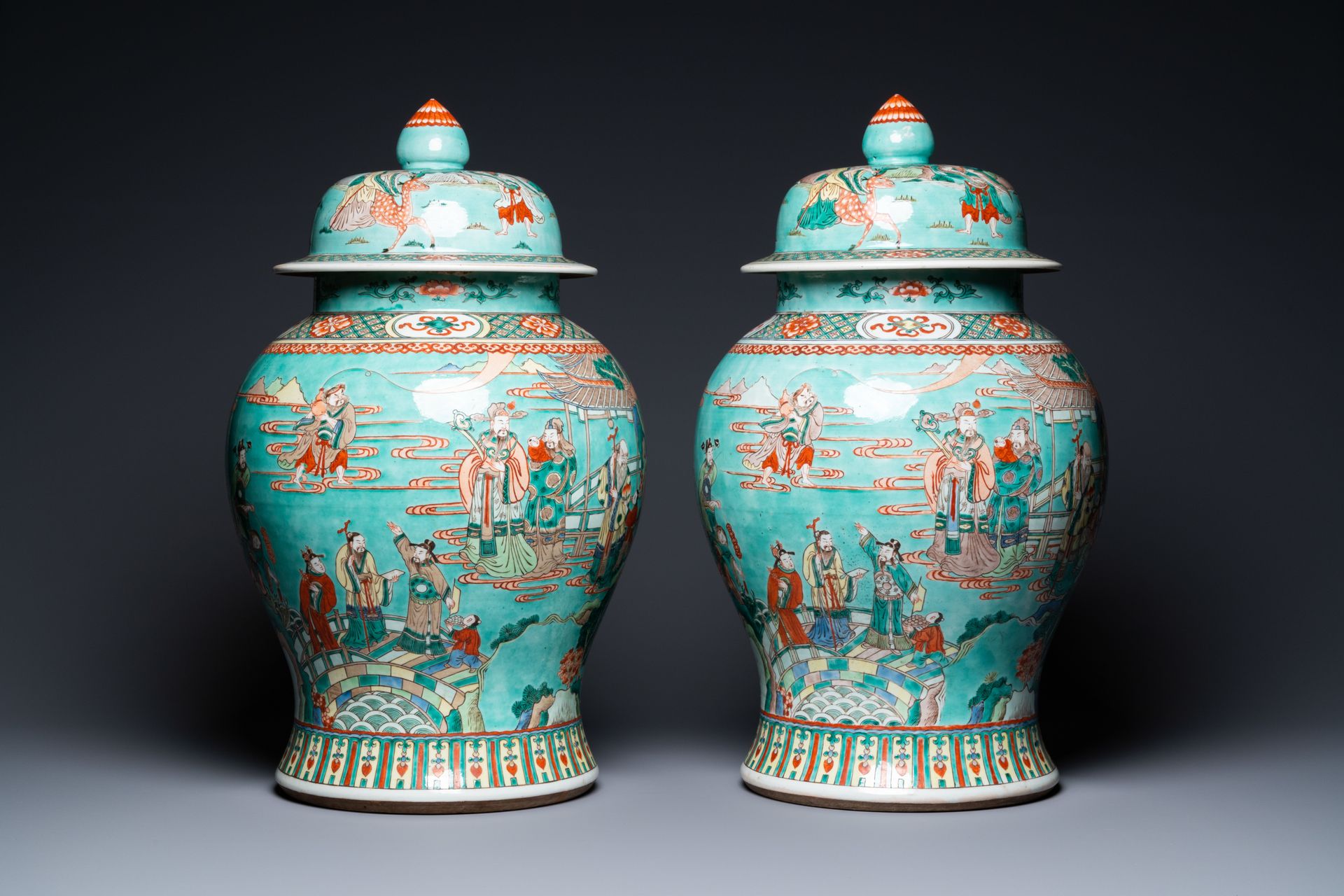 A pair of large Chinese turquoise-ground famille verte vases and covers, 19th C.&hellip;